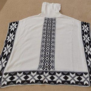 Ivory/black turtleneck poncho